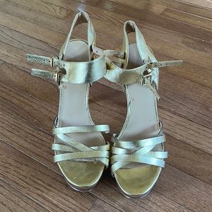Size 9.5 Nine West gold platform heels